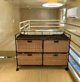 ESCAPEROO ONE - Additional loft storage beyond the clothing dresser which wraps around the kitchen area below.