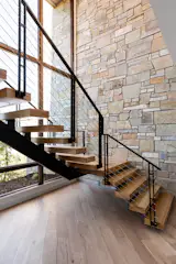 Views are abundant when descending this floating staircase.