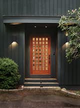 Existing front door with beveled glass was re-finished and re-used 