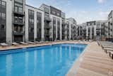 The Marq offers an extensive collection of indoor and outdoor amenities designed to enhance daily life. Residents can relax in the beautifully landscaped courtyard, which features a swimming pool, sundeck, private kitchens, BBQ and dining areas, fire pits, and a dog run.