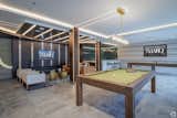 Inside, the community provides thoughtfully designed co-working areas, private conference rooms, entertainment lounges, and café spaces, along with a state-of-the-art fitness center and pet spa. 