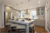 Luxury kitchens feature granite or quartz countertops, stainless steel Kohler fixtures and GE appliance packages.