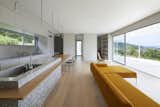 Kitchen, Light Hardwood Floor, Pendant Lighting, and Quartzite Counter  Photo 10 of 20 in House in Shiraiwa by Tsukasa Okada / 2id Architects