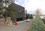 Steel clad West elevation, internal double garage