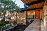 Entry Goals... Original Rock walls pass through into the interior entryway. A restored vertical cedar privacy wall sets this curb appeal on FIRE!