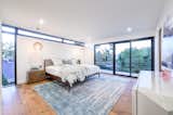 The perfect positioning of windows makes this master bedroom light and inviting
