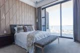Bedroom, Carpet Floor, Night Stands, Pendant Lighting, and Bed Bedroom  Photo 19 of 27 in The Estate Penthouse by Tatum Brache