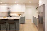 The kitchen was opened up to the original living room and fireplace.