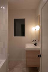 The original bathroom was re-fitted with new fixtures and millwork.