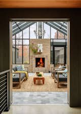 Working greenhouse and family room, view from the kitchen and looking to the kitchen garden beyond