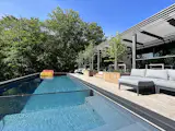 Exterior View of outdoor multi-level entertaining decks and container pool/spa.