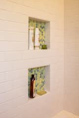 Green and yellow penny tile niches.