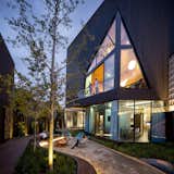 Outdoor, Side Yard, Vertical Fences, Wall, Gardens, Front Yard, Shrubs, Garden, Grass, Landscape Lighting, and Metal Fences, Wall Beach courtyard  Photo 4 of 21 in The N M Bodecker Foundation by Skylab Architecture