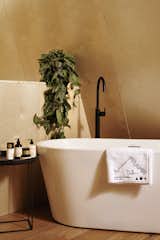 Bath Room, Medium Hardwood Floor, and Freestanding Tub  Photo 14 of 19 in A Frame Club by Skylab Architecture