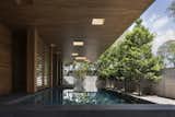 Aperture House by Formwerkz Architects garden, front patio, tropical architecture, screens, cantilevering roof