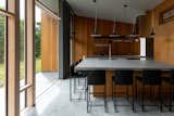 The kitchen-cum-dining is designed for both intimate meals and hosting friends in a casual setting. 