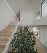 Staircase in Baan Saimai home by Anonym Studio
