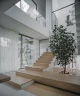 Staircase in Baan Saimai home by Anonym Studio