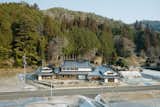 Architect Reiichi Ikeda renovated this house in Jinseki, Japan, in two phases, starting with the main house (center) and annex (left).