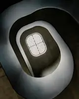 The skylight at the top of the staircase brings daylight deep into the plan. 