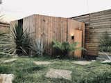 Garden studio room, clad in treated, sawn pine panels