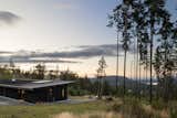 Exterior, Cabin Building Type, Metal Roof Material, Wood Siding Material, and Shed RoofLine View toward St. Mary Lake  Photo 4 of 17 in Meyers Residence by W  O  V  E  N   Architecture and Design