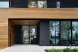 Exterior, Wood Siding Material, Metal Roof Material, Flat RoofLine, House Building Type, and Glass Siding Material View at Entry  Photo 3 of 10 in Vertes Retreat by W  O  V  E  N   Architecture and Design