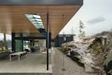 Exterior, Flat RoofLine, Metal Roof Material, Wood Siding Material, Glass Siding Material, and House Building Type View at Outdoor Covered Patio  Photo 4 of 10 in Vertes Retreat by W  O  V  E  N   Architecture and Design