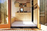 The out swing french doors open up to the living space inside. 