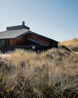 Plover Front of House with the Grass Swept Dunes