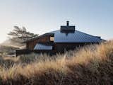 Plover Side of House with the Grass Swept Dunes