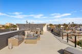 Built in kitchen allows for the ultimate in outdoor entertaining. Walk score of 75, allowing you a short walk to the sand, the transit center, downtown, and shops.
