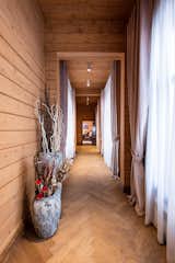 Hallway and Medium Hardwood Floor  Photo 6 of 21 in Guest House by Maxim Gayevskiy