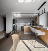 Kitchen and dining area - The clients wanted their dining area to be multifunctional: a space for work and dining but also for it to feel a bar, perfect for entertaining. 