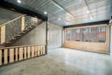 Living/Dining Area with Polished Concrete Floors, PA Curly Maple Window Wall & Balustrade