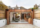 A Cloistered House by Turner Architects courtyard, dining room, kitchen.