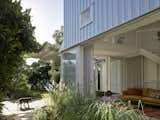 A Family’s Queenslander Cottage Is Cracked Open With an Airy, Shed-Like Addition