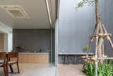 Mit Chit House by Looklen Architects dining area and courtyard