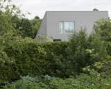  Photo 2 of 19 in A House With a Green Roof Tucks Into the Landscape in Lithuania