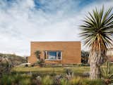 A West Texas Couple Get a Rammed-Earth Addition That Syncs With the Landscape - Photo 1 of 16 - 