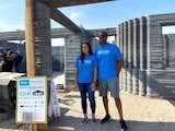 Shawn and Marcus Shivers stand among the beginnings of their new home in Tempe, Arizona, which was built using an on-site gantry 3D printer and is targeting LEED Platinum certification.