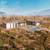 EYRC Architects is partnering with Oakland-based construction company Mighty Buildings on a new 3D-printed community in Desert Hot Springs, California. Construction on the first unit began earlier this year, and the initiative uses a kit-of-parts approach to 3D print wall panels which are then assembled on-site.