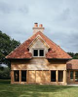 The roof profile of the addition is a direct reference to the hipped roof of the main house.