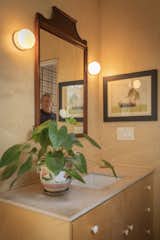 The plywood continues to Eduardo's bathroom, as does the nautical artwork.  Photo 9 of 12 in Construction Diary: In Los Angeles, a Couple Create a Multigenerational Haven