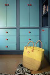 In their son's closet, painting the casework bright colors helped bring character and life to the space.  Photo 6 of 12 in Construction Diary: In Los Angeles, a Couple Create a Multigenerational Haven
