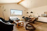 Converting the garage to a creative office gave the couple much more usable interior space. The room doubles as a lounge and dining room.
