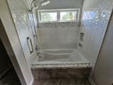 Before: Bathroom in Rockbrook Remodel by Workaday Design