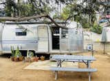 During construction, Eric and his family lived in an Airstream in their front yard. They still used their home’s kitchen and bathroom but retreated here for bedtime. Eric has since passed the trailer on to a friend who’s doing their own renovation.