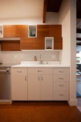 Eric renovated the kitchen in the ’50s home, one of several updates he made to it while his family lived there.