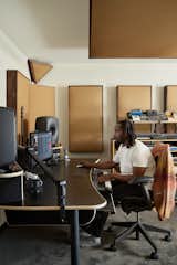 "I wanted the space to be homey, so people come into the space and it's not overbearing, but just a dope creative space to work in,  Photo 19 of 23 in Before & After: An L.A. Music Producer’s Latest Collab? Turning a Midcentury Into His Family Home